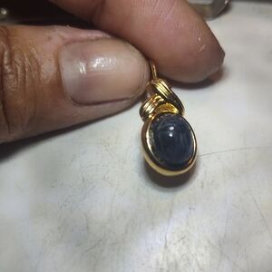 Elegant Gold and Black Pendant